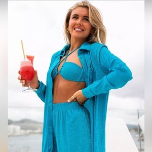 Never worn set, button up and shorts, (swim suit top Not included) size medium.